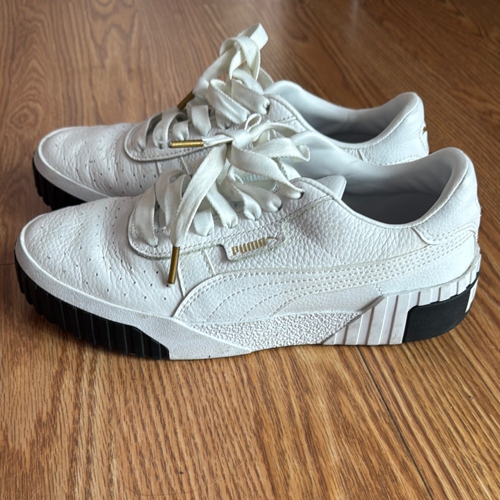 Puma White Sneakers with Black and Gold Details